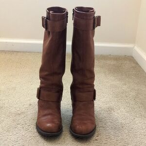 Women riding knee high boots